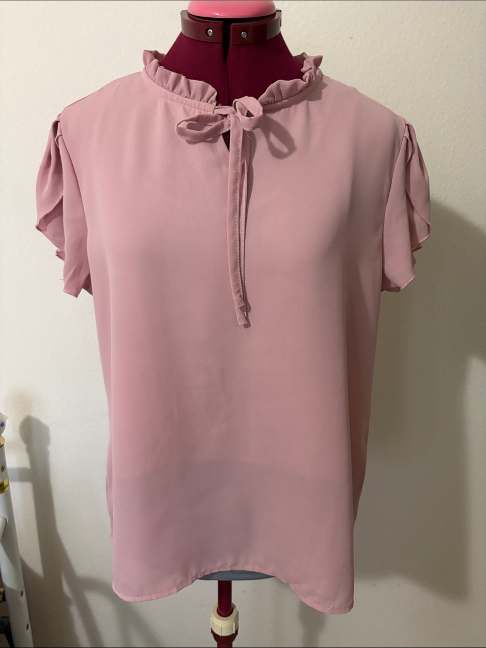 Man Na size Medium light pink ruffled blouse. Lining in the front 100% polyester